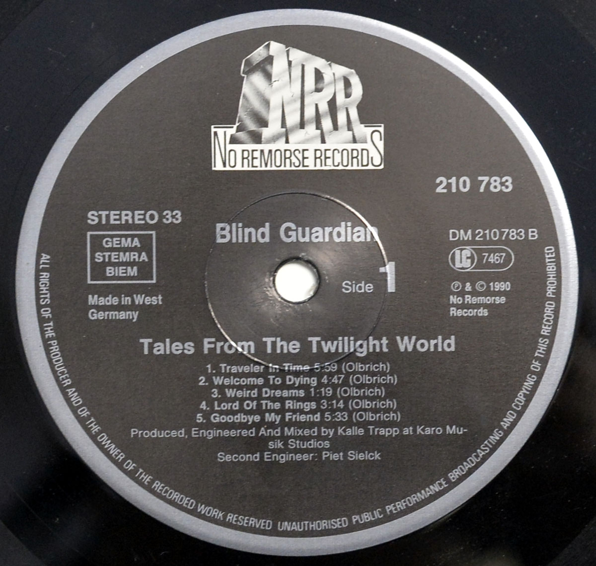 Blind Guardian 'Tales from the Twilight World' vinyl label for Side 1. The No Remorse Records logo is prominently displayed at the top, with tracklist details, production credits, and copyright information printed in white on a black background.